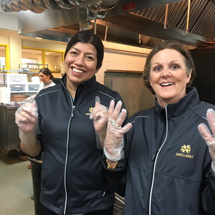 Mirella Riley, program director of academic recruitment and liaison, and Annette Edwards, office services coordinator, are gloved and ready to go.