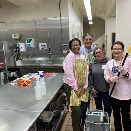 Pictured, left to right, in the kitchen at St. Margaret's House are Dawn Foster, assistant director of finance and administration; Matt Zyniewicz, the dean's executive administrator;
Linda Brady, office services coordinator; and
Sarah Mustillo, the I.A. O'Shaughnessy Dean.