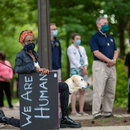 Members of the Notre Dame community stand on the library quad and listen to the speakers. An estimated 1,000 people attended the “Prayer for Unity, Walk for Justice” on Monday, June 1. (Photo by Matt Cashore/University of Notre Dame)