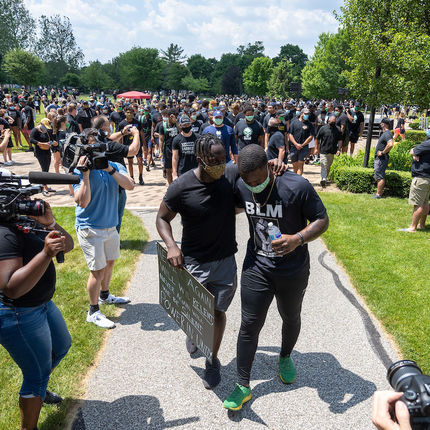 Members of the Notre Dame football team organized a rally and walk for the campus community in recognition of Juneteenth. (Photo by Matt Cashore/University of Notre Dame)