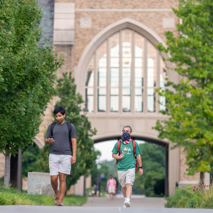Students go to their classes on the morning of the first day of fall semester 2020. (Photo by Matt Cashore/University of Notre Dame)