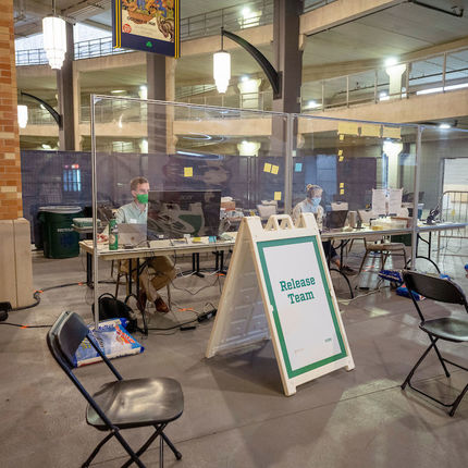 If you have an appointment to get a COVID test, the release table is one of the last stops. (Photo by Barbara Johnston/University of Notre Dame)