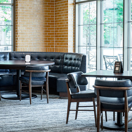 Floor to ceiling windows bring in light while showcasing beautiful seating in Rohr's.  (Photo by Matt Cashore/University of Notre Dame)