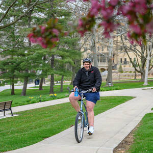 Jerry completes the last leg of his bike journey. (Photo by Matt Cashore/University of Notre Dame)