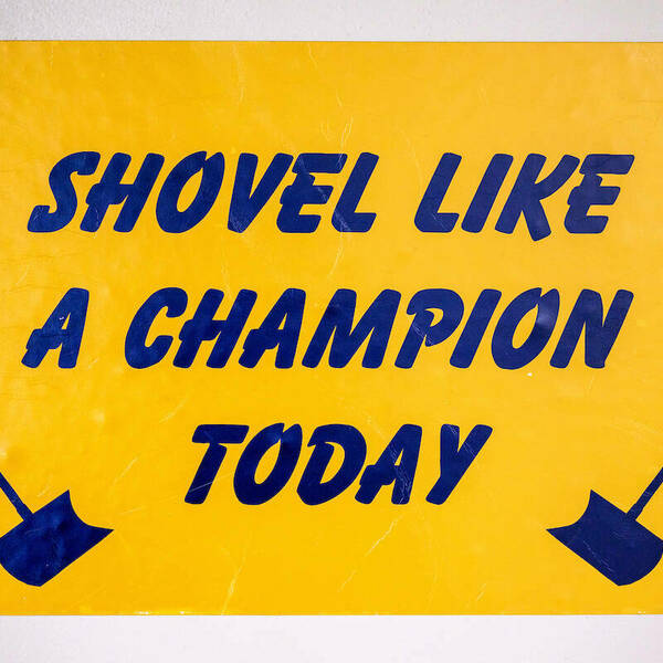 Sign that says, Shovel like a champion today.